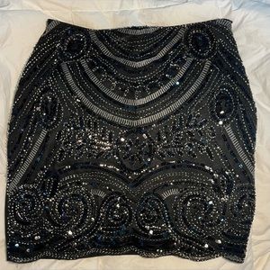 Black sequin mini skirt